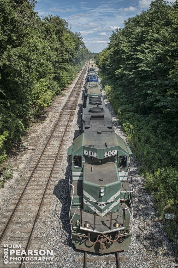 August 21, 2015 – Paducah & Louisville Railway's 2107 heads south approaching the yard at Princeton, Ky as it heads up a load of military equipment. - Tech Info: 1/1000sec, f/9, ISO 100, Lens: Sigma 24-70 @ 24mm on a Nikon D800 shot and processed in RAW.