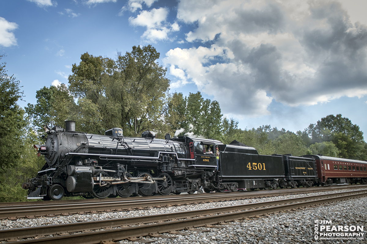 September 12, 2015 - The Tennessee Valley Railroad Museum's Southern Railway 4501 heads into the wye at Citico Junction on the Norfolk Southern Mainline at Chattanooga, Tennessee after returning with a loaded passenger train from Cleveland, Tennessee during the Museum's 2015 Railfest. The train was turned in the they wye and then headed back to the TVRM station. 4501 was built by Baldwin Locomotive Works in 1911 for the Southern Railway, the 4501 was the first of its class on that railroad. The wheel arrangement is a 2-8-2, known as a Mikado since the first of this type were sold to Japan. 4501 served the Southern until the 1940s when the railroad began buying diesel locomotives and phasing out steam operations. It then then saw service on a small coal-hauling railroad in Kentucky. Since the mid-1960s, 4501 has pulled countless passenger excursion trains across the Southern (later Norfolk Southern) Railway. The 4501 ended its service in 1999 due to rising maintenance costs. However, with the start of Norfolk Southern’s “21st Century Steam” program, the 4501 returned to service this year. Tech Info all photos: 1/1000sec, f/5.6, ISO 720, Lens: Sigma 24-70 @ 24mm with a Nikon D800 shot and processed in RAW.