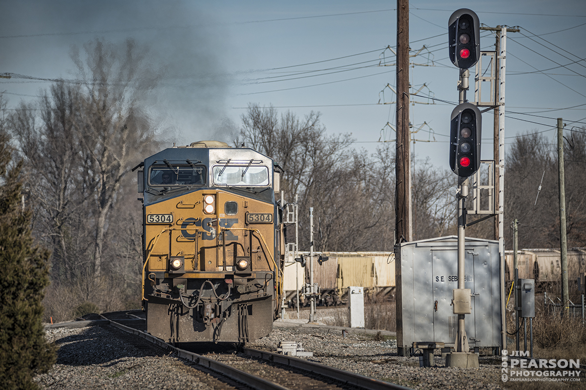 January 5, 2016 - CSX loaded grain train G166 pulls out of the siding at Sebree, KY as it heads south on the Henderson Subdivision. - Tech Info: 1/2000 | f/5.6 | ISO 200 | Lens: Sigma 150-600 @ 280mm with a Nikon D800 shot and processed in RAW.