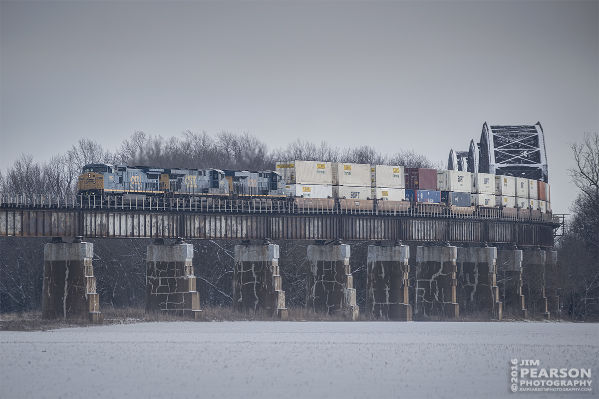 January 20, 2016 - CSX Q028 makes its way down the viaduct at Rham, Indiana, crossing the bridge at the Ohio River in Henderson, KY, as it heads south on the Henderson Subdivision. - Tech Info: 1/1250 | f/5.6 | ISO 100 | Lens: Sigma 150-600 @ 300mm with a Nikon D800 shot and processed in RAW.