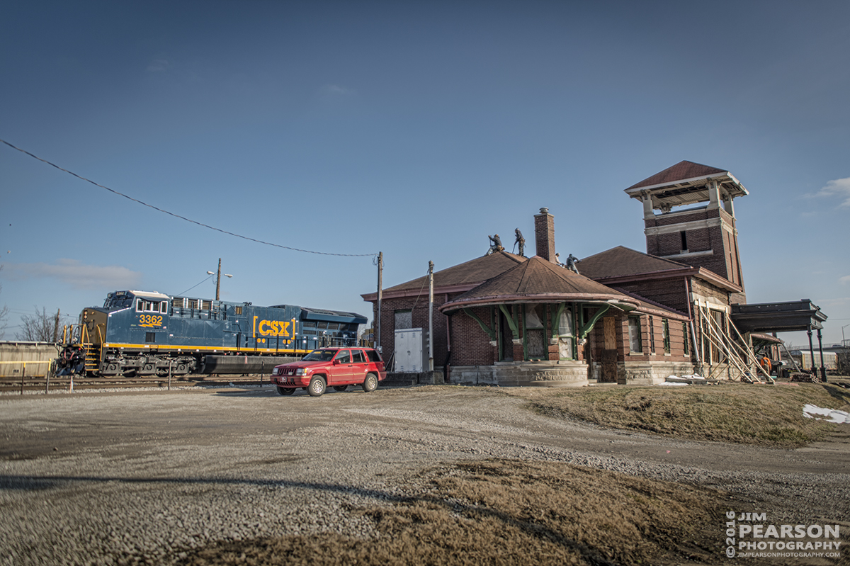 January 27, 2016 - CSX Q294 passes the old Louisville and Nashville Railroad depot at Henderson, Ky as it heads north on the Henderson Subdivision. Workers have began the task of starting to restore the old station that was saved from demolition. - Tech Info: 1/1250 | f/2.8 | ISO 160 | Lens: Sigma 24-70 @ 24mm with a Nikon D800 shot and processed in RAW. ‪#‎jimstrainphotos‬ Here's where you can see what's going on with the project: https://www.facebook.com/hendersontraindepot?fref=nf