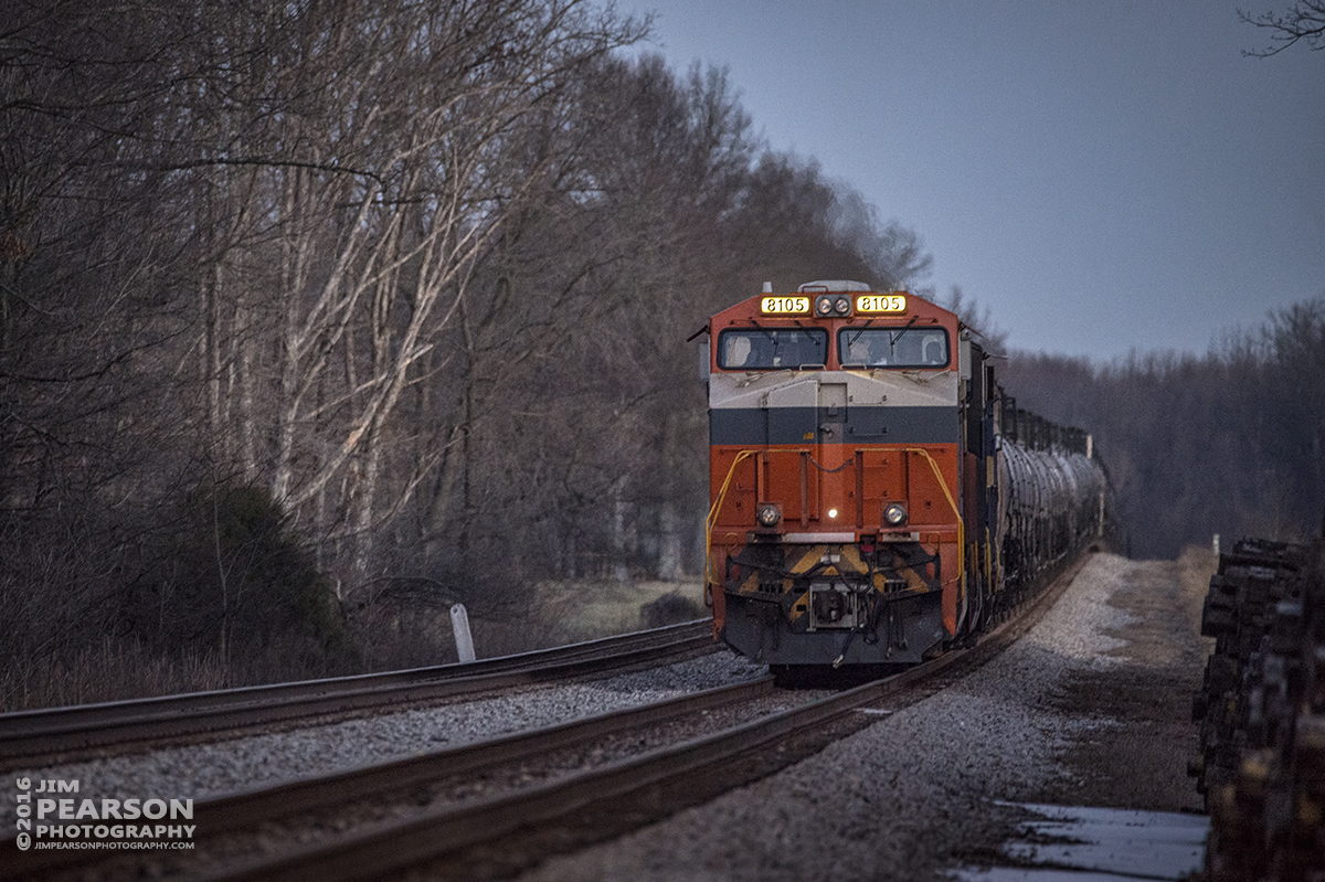 January 28, 2016 - CSX empty tank train K442-27 sits in the the fading light of the day at the north end of Cedar Hill, Tennessee with Norfolk Southern's Interstate Heritage Unit 8105 in the lead, waiting for a southbound before heading on north on the Henderson Subdivision. - Tech Info: 1/160 | f/6 | ISO 4000 | Lens: Sigma 150-600 @ 500mm with a Nikon D800 shot and processed in RAW.