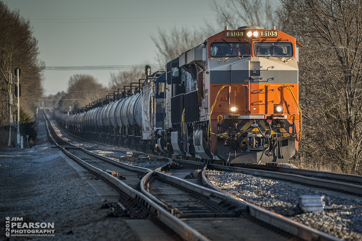 January 28, 2016 - CSX empty tank train K442-27 approaches the Experimental Station Road crossing in Springfield, Tennessee with Norfolk Southern's Interstate Heritage Unit 8105 in the lead as they head north on the Henderson Subdivision. Last word was the train was tied down at Casky Yard in Hopkinsville, Ky for the night so those to the north might catch it in daylight tomorrow!   - Tech Info: 1/1250 | f/5.6 | ISO 500 | Lens: Sigma 150-600 @ 500mm with a Nikon D800 shot and processed in RAW. ?#?jimstrainphotos?