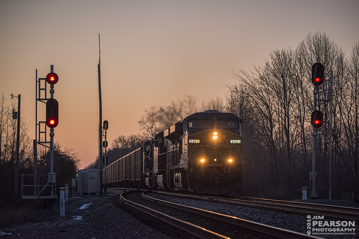 January 28, 2016 - CSX loaded coal train N006-27 passes the signals at the north end of Cedar Hill, Tennessee siding as the light fades from the sky on the Henderson Subdivision. - Tech Info: 1/1250 | f/5 | ISO 3600 | Lens: Sigma 150-600 @ 150mm with a Nikon D800 shot and processed in RAW.