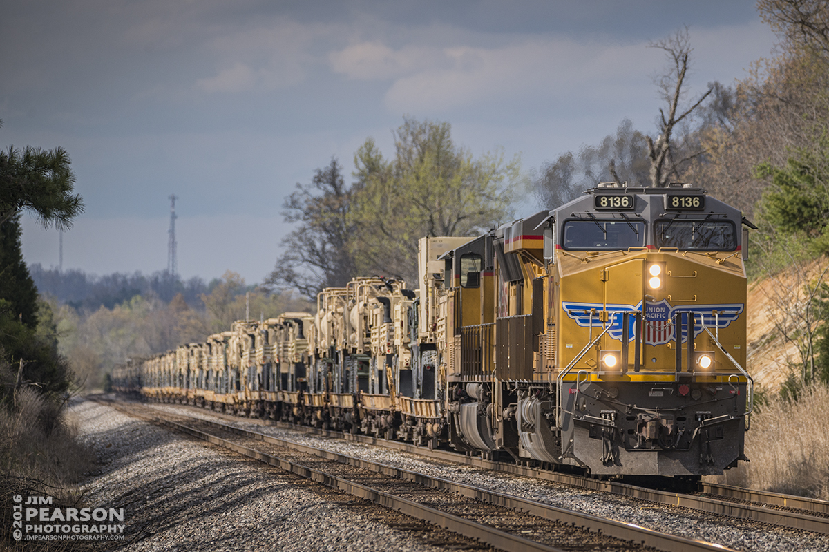 April 8, 2016 - CSX W864-30, with Union Pacific 8135 in the lead, prepares to pull out of the siding at the south end of Slaughters, Ky as it heads south on the Henderson Subdivision with a loaded military train. - Tech Info: 1/1600 | f/5.6 | ISO 400 | Lens: Sigma 150-600 @ 310mm on a Nikon D800 shot and processed in RAW.