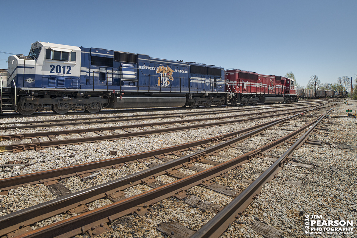 April 12, 2016 - CSX Z462-12 (PAL LGE coal train), waits at the south end of Atkinson Yard in Madisonville, Ky for a southbound CSX Q647 to pass, with Paducah and Louisville Railway UofL 2013, UK 2012 and 4516 as power.  - Tech Info: 1/1000 | f/5.6 | ISO 280 | Lens: Rokinon 14mm on a Nikon D800 shot and processed in RAW.