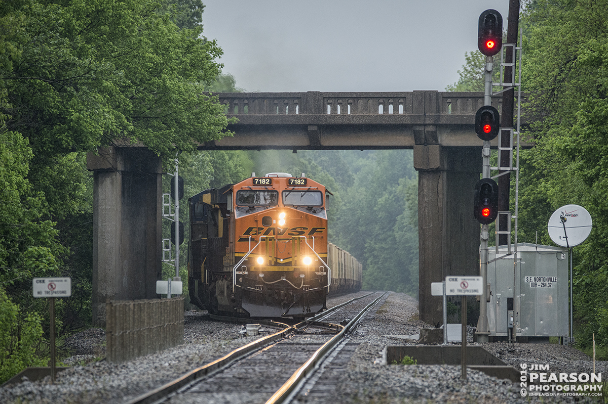 April 30, 2016 - CSX K893-29 pulls out of the siding at the south end of Nortonville, Ky with BNSF 7162 leading the way, as it passes under the highway 62 overpass heading south on the Henderson Subdivision. - Tech Info: 1/800 | f/6 | ISO 1400 | Lens: Sigma 150-600 @ 370mm on a Nikon D800 shot and processed in RAW.