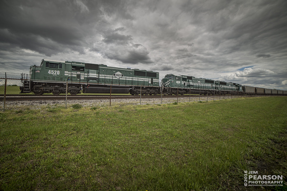 May 3, 2016 - A Evansville Western Railway coal train unloads at the Mt Vernon Transfer Terminal in Mt. Vernon, Indiana with SD70AC engines 4520, 4519 and 4517 as its power. - Tech Info: 1/1600 | f/2.8 | ISO 100 | Lens: Rokinon 14mm on a Nikon D800 shot and processed in RAW.