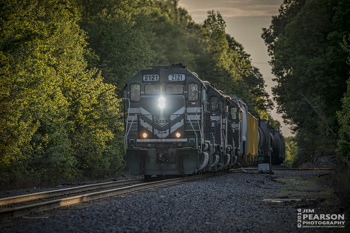 May 3, 2016 - A Paducah and Louisville Railway local with engine 2121 leading approaches West Yard as it passes the Warrior Coal Mine Lead switch at Madisonville, Ky heading south. - Tech Info: 1/1000 | f/5.6 | ISO 560 | Lens: Sigma 150-600 @ 340mm on a Nikon D800 shot and processed in RAW.
