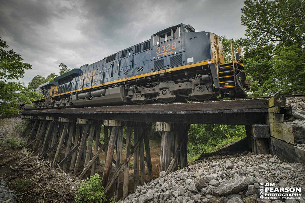 May 10, 2016 - CSX L025 passes over a small trestle as it approaches Mortons Junction at Mortons Gap, Ky on its way south along the Henderson Subdivision. - Tech Info: 1/2000 | f/2.8 | ISO 640 | Lens: Rokinon 14mm on a Nikon D800 shot and processed in RAW.