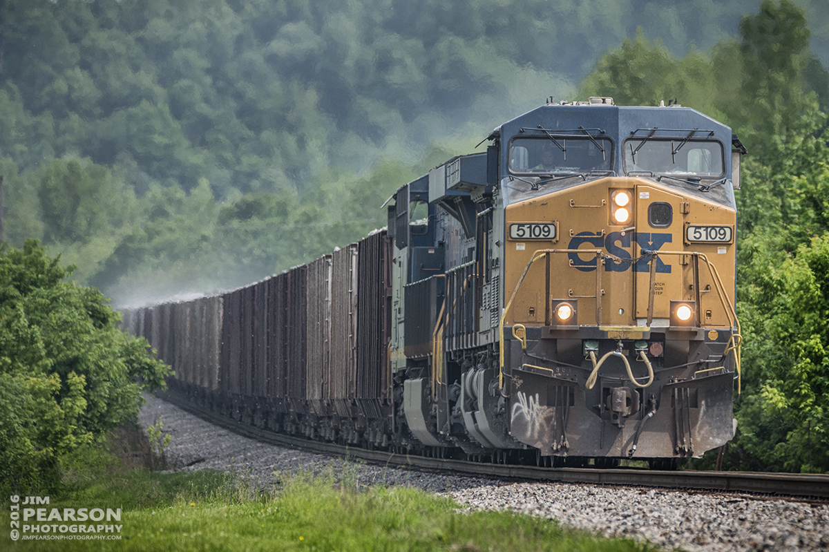 May 10, 2016 - Dust floats off CSX loaded ballast train, W082, as it heads into Earlington, Ky as it heads north on the Henderson Subdivision with CSXT 5109 in the lead. - Tech Info: 1/2000 | f/5.6 | ISO 800 | Lens: Sigma 150-600 @ 350mm on a Nikon D800 shot and processed in RAW.