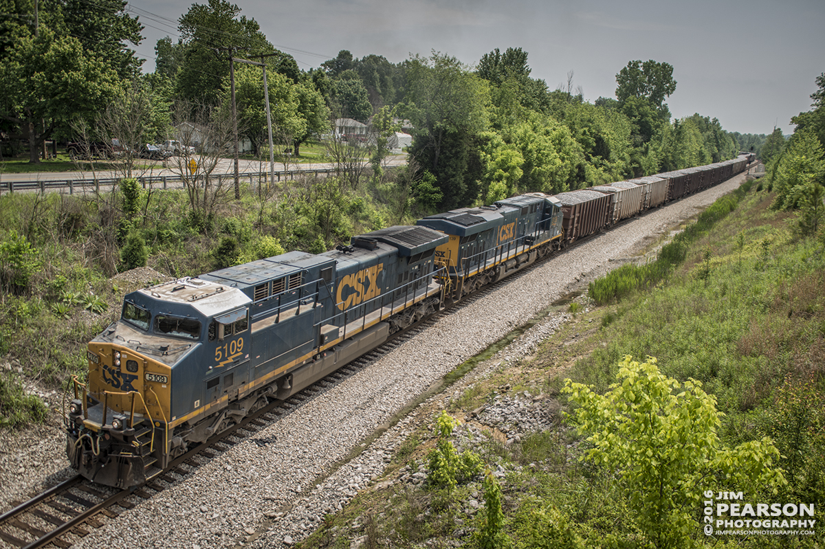 May 11, 2016 - CSXT 5109 pulls out of the siding at the north end of Romney at Nortonville, Ky with loaded ballast train, W082, as it heads north on the Henderson Subdivision. - Tech Info: 1/2000 | f/28 | ISO 200 | Lens: Sigma 24-70 @ 29mm on a Nikon D800 shot and processed in RAW.