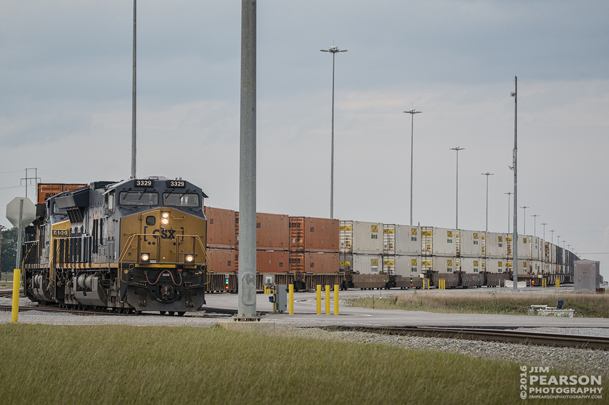 May 28, 2016 - CSX Q025-25 (Chicago, IL (Bedford Park) - Jacksonville, FL) snakes its way out of Casky Inspection Yard, after receiving fuel, as it continues its move south on the Henderson Subdivision. - Tech Info: 1/1000 | f/9 | ISO 560 | Lens: Sigma 150-600 with 1.4 teleconverter @ 850mm on a Nikon D800 shot and processed in RAW.