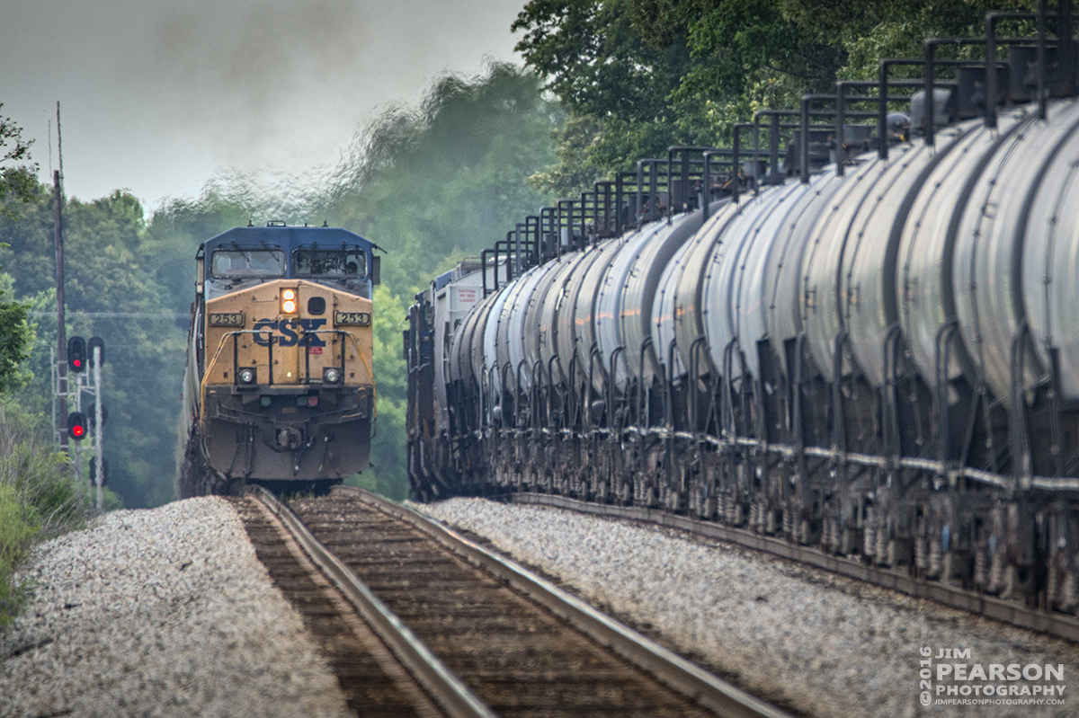 May 18, 2016 - CSX Q597 (Chicago, IL - Nashville, TN) crests the hill as it passes empty ethanol train K458-27 (Pelzer, SC - Proviso, IL) at the north end of Crofton, Ky as it moves south on the Henderson Subdivision. - Tech Info: 1/1000 | f/6.3 | ISO 800 | Lens: Sigma 150-600 @ 600mm on a Nikon D800 shot and processed in RAW.