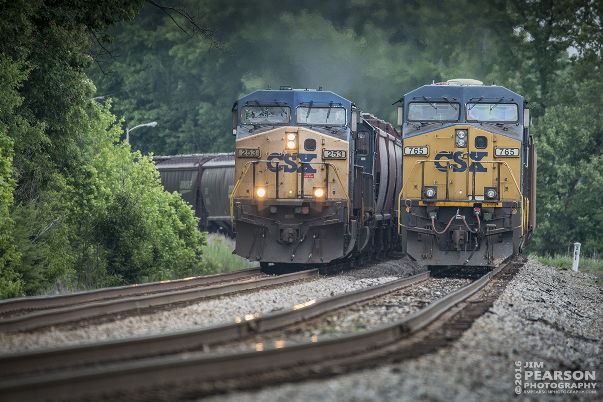 May 28, 2016 - CSX Q597 passes loaded DPU coal train N013-26 in the siding at the south end of Romney siding as it heads south at Nortonville, Ky on the Henderson Subdivision. - Tech Info: 1/1000 | f/6.3 | ISO 1100 | Lens: Sigma 150-600 @ 600mm on a Nikon D800 shot and processed in RAW.