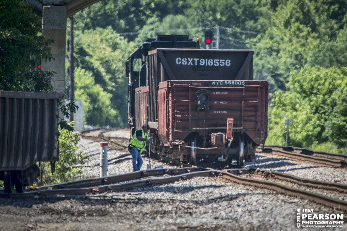 May 30, 2016 - The Conductor on CSX C016-30 throws the switch in the house track at Nortonville, Ky, on the Henderson Subdivision, as they prepare to tie their train down for the night. - Tech Info: 1/640 | f/9 | ISO 900 | Lens: Nikon Sigma 150-600 with a 1.4 teleconverter @ 800mm on a Nikon D800 shot and processed in RAW.