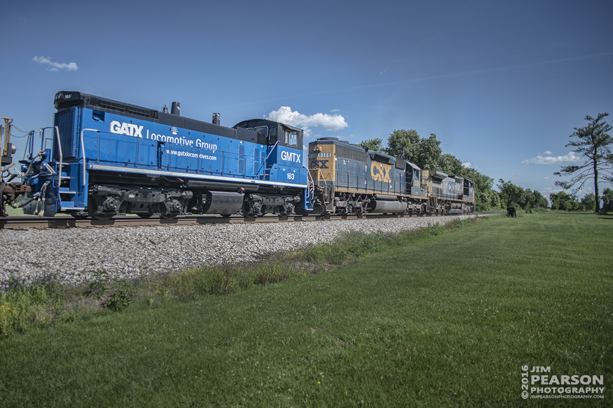 May 30, 2016 - I'm sure it was just for my birthday when CSX sent Q587 south with what looks to be a brand new rebuilt GATX/GMTX switcher #163 in the lashup of six engines as they made their way into Crofton, Ky and on south down the Henderson Subdivision. - Tech Info: 1/2500 | f/2.8 | ISO 140 | Lens: Nikon 18mm on a Nikon D800 shot and processed in RAW.