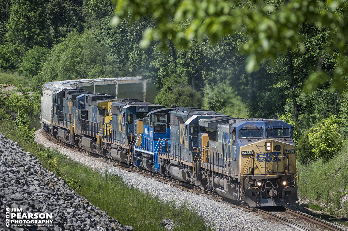 May 30, 2016 - CSX Q587 (Madisonville, KY - Nashville, TN) heads south out of Nortonville, Ky with what looks to be a brand new rebuilt GATX/GMTX switcher #163 in the lashup of six engines as they made their way down the Henderson Subdivision. - Tech Info: 1/640 | f/7.6 | ISO 140 | Lens: Nikon Sigma 15-600 @ 300mm on a Nikon D800 shot and processed in RAW.