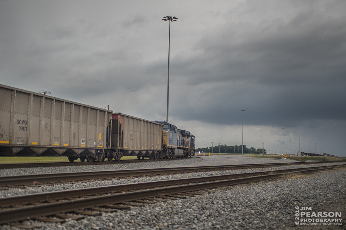 June 3, 2016  CSX empty coal train E302 (Stilesboro, GA - Evansville, IN (EVWR)) pulls into the south end of Casky Inspection Yard at Hopkinsville, Ky on the Henderson Subdivision under stormy skies. - Tech Info: 1/320 | f/2.8 | ISO 850 | Lens: Sigma 24-70 @ 42mm with a Nikon D800 shot and processed in RAW.