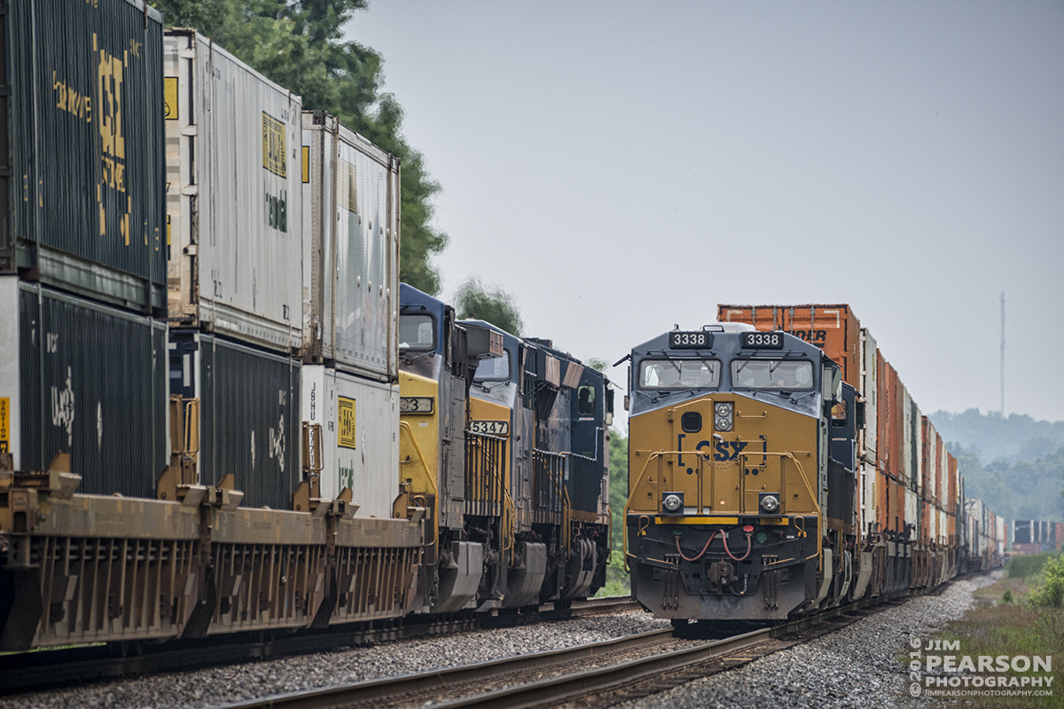 June 3, 2016  CSX Q028-03 meets Q029-03 at the south end of the siding at Slaughters, Ky as they both move their hot intermodal trains along the Henderson Subdivision. - Tech Info: 1/2000 | f/5.6 | ISO 720 | Lens: Sigma 150-600 @ 320mm with a Nikon D800 shot and processed in RAW.