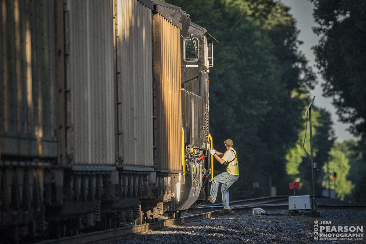 June 8, 2016  The conduction climbs back aboard Paducah and Louisville Railways LSX1, a Norfolk Southern Train with a brand new 3616 Tier 4 ET44AC leading on its first revenue run, after throwing the Pee Vee Spur switch at West Yard as they start their early morning run to Warrior Coal in Madisonville, Ky. - Tech Info: 1/2500 | f/6.3 | ISO 4000 | Lens: Sigma 150-600 @ 550mm with a Nikon D800 shot and processed in RAW.