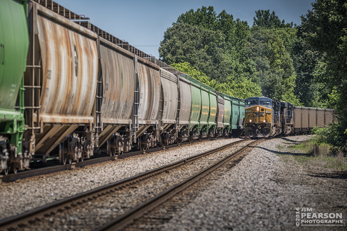 June 10, 2016  CSX empty coal train E040-10 (Taft, FL - Evansville, IN) passes Q515 (Indianapolis, IN - Nashville, TN) at Nortonville, Ky as it heads north on the Henderson Subdivision. - Tech Info: 1/1600 | f/5.3 | ISO 450 | Lens: Sigma 150-600 @ 2100mm with a Nikon D800 shot and processed in RAW.