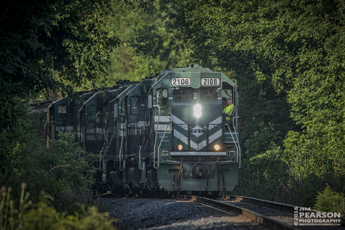 June 14, 2016  A Paducah and Louisville Railway local, with engine 2018 in the lead, rounds the curve approaching the Earlington Road Crossing in Richland, Ky as it heads to Princeton, Ky with a short freight.  - Tech Info: 1/1600 | f/6.3 | ISO 1250 | Lens: Sigma 150-600 @ 600mm with a Nikon D800 shot and processed in RAW.