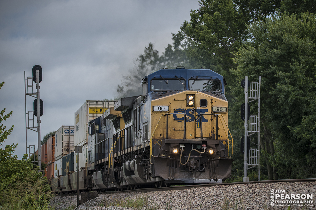 June 27, 2016  CSX intermodal Q102-27 (East Savannah, GA - Chicago, IL) passes through the signals at the north end of Nortonville, Ky as it heads north on the Henderson Subdivision with CSXT 90 in the lead. - Tech Info: 1/2000 | f/5 | ISO 560 | Lens: Sigma 150-600 @ 150mm with a Nikon D800 shot and processed in RAW.