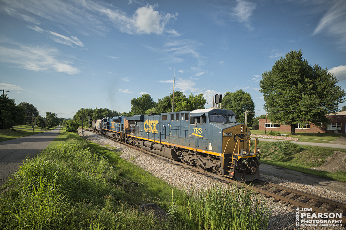 June 28, 2016  CSX daily manifest train Q645-27 (Chicago, IL (Barr Yard) - Nashville, TN) heads under the highway 41 bridge at Mortons Gap, Ky as it makes its way south on the Henderson Subdivision. - Tech Info: 1/2000 | f/2.8 | ISO 720 | Lens: Rokinon 14mm with a Nikon D800 shot and processed in RAW.