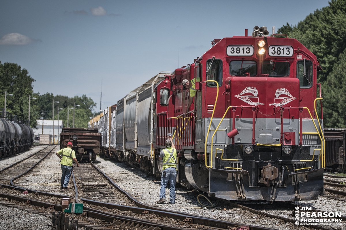 June 29, 2016  Engineer on RJ Corman's 3813 drops a car manifest to a waiting crewman on the ground after arriving at CSX's Guthrie Yard in Guthrie, Ky. - Tech Info: 1/6400 | f/5 | ISO 640 | Lens: Sigma 150-600 @ 150mm with a Nikon D800 shot and processed in RAW.