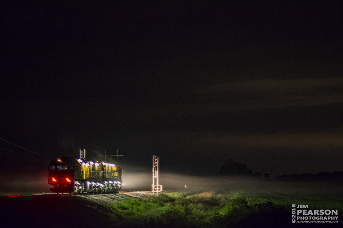 July 9, 2016  LORAM Railgrinder RGS-9 arries at the south end of Rankin Siding at Rankin, Ky to begin it's night of grinding switches and crossings on CSX's Henderson Subdivision. - Tech Info: 1/40 | f/1.4 | ISO 2000 | Lens: Nikon 50mm on a Nikon D800 shot and processed in RAW.