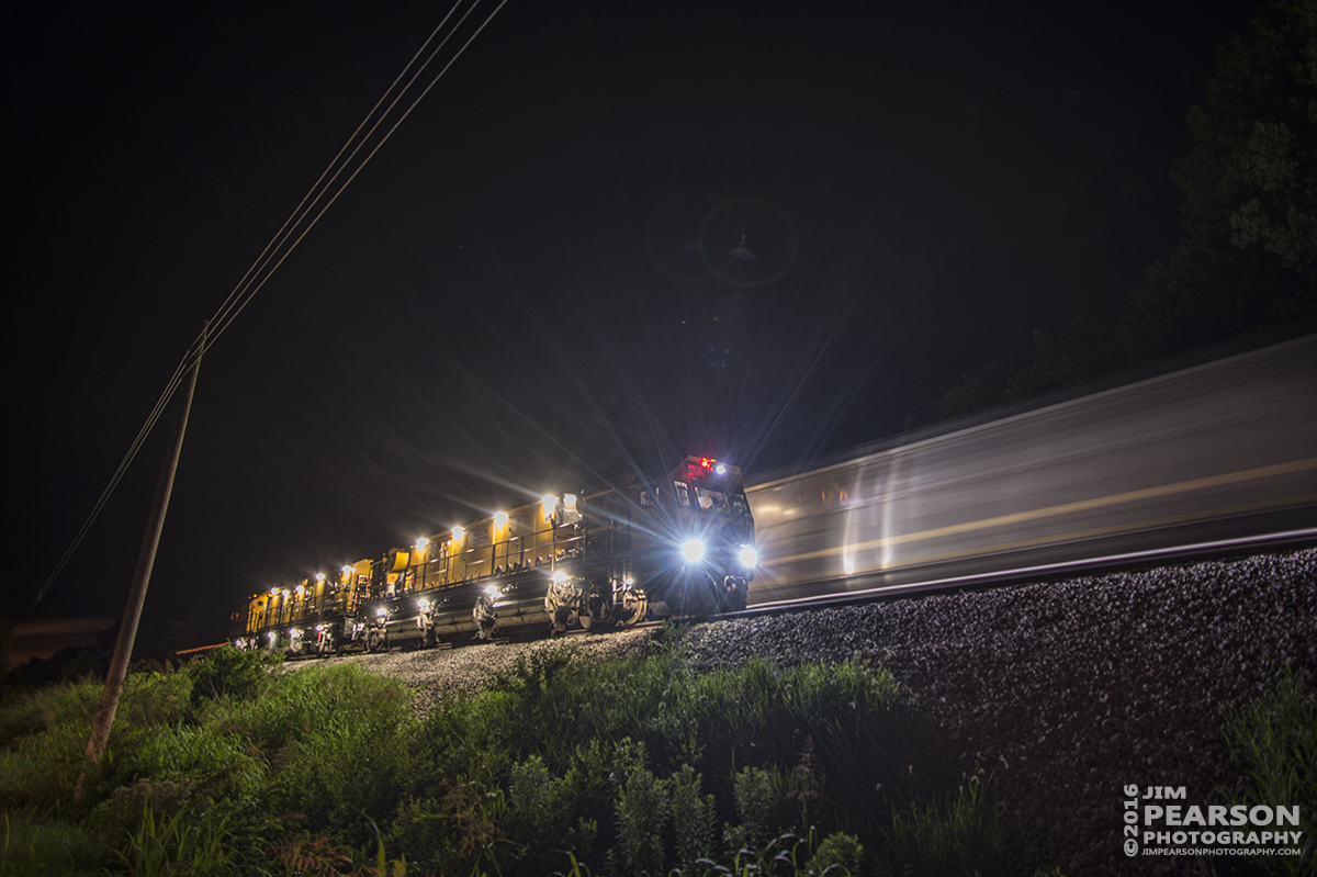 July 9, 2016  LORAM Railgrinder RGS-9 waits in the siding at the north end of Robards, Ky as southbound loaded coal train CSX N040-05 passes it on CSX's Henderson Subdivision. - Tech Info: 3 seconds | f/2.8 | ISO 125 | Lens: Nikon 18mm with a Nikon D800 shot and processed in RAW.