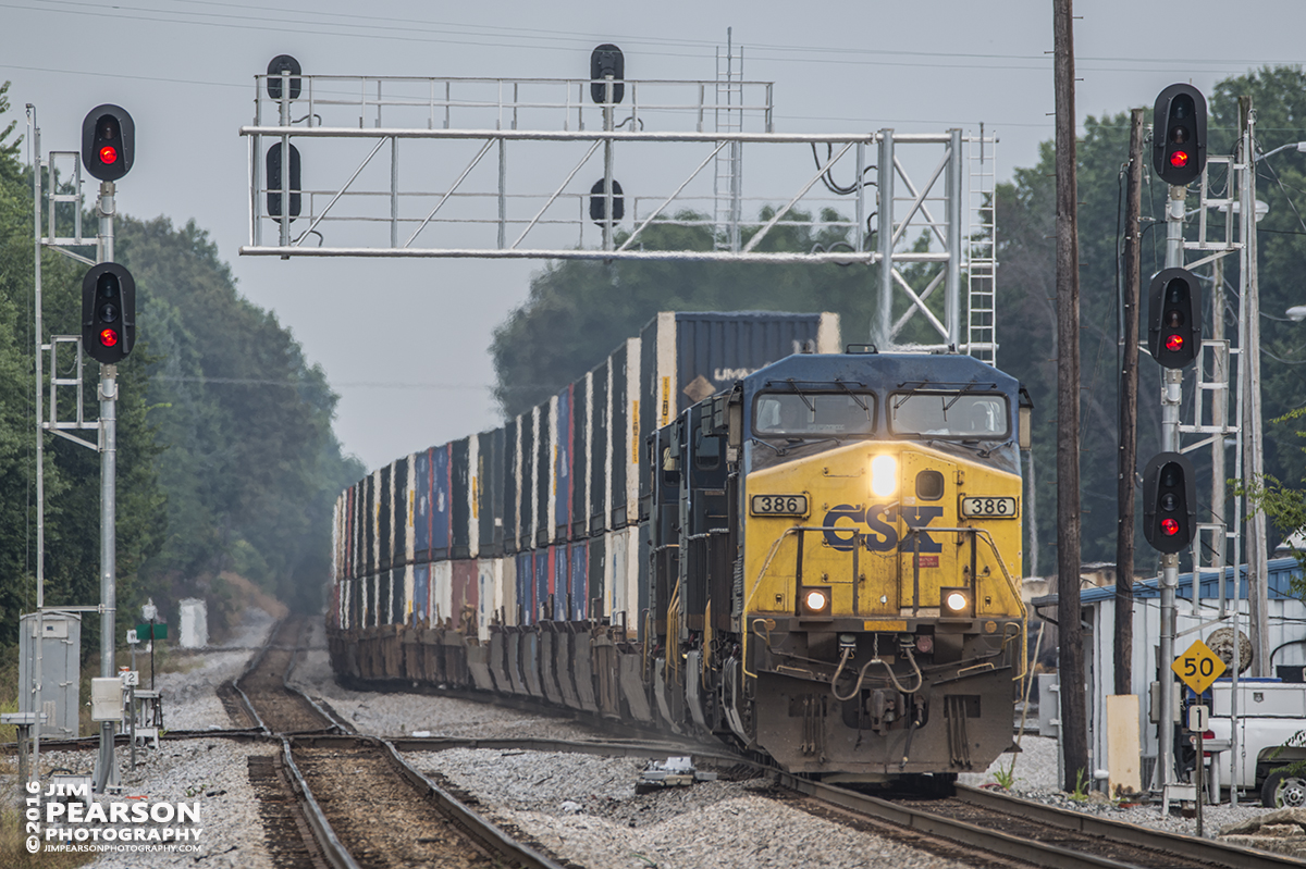 July 22, 2016  CSX Q124 (Jacksonville, FL - Chicago, IL) passes the signals at the north end of Guthrie yard as it heads north with its intermodal train at Guthrie, Ky on the Henderson Subdivision. - Tech Info: 1/60 | f/6 | ISO 100 | Lens: Sigma 150-600 @ 440mm with a Nikon D800 shot and processed in RAW.