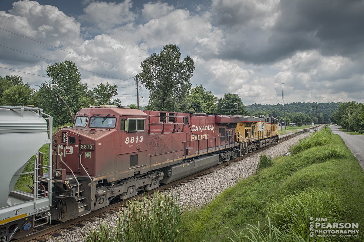 August 2, 2016  CSX S515-02, (Indianapolis, IN - Nashville, TN) with Union Pacific 5543 leading and Canadian Pacific 8813 trailing, passes through Mortons Gap, Ky with its 10,000 foot train southbound on the Henderson Subdivision. - Tech Info: 1/1000 | f/6.3 | ISO 560 | Lens: Sigma 24-70 @ 24mm with a Nikon D800 shot and processed in RAW.