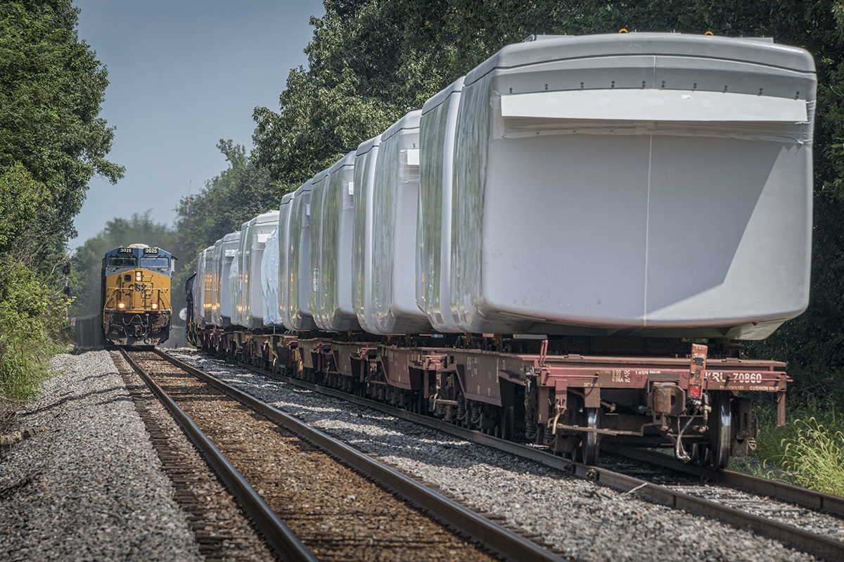 August 5, 2016 – Southbound CSX loaded coal train N320 (Evansville, IN (EVWR) - Cross, SC) meets W987-30 with a load of windmill motors waiting to go north from the north end of Hanson siding as N320 makes it's way south on the Henderson Subdivision at Hanson, Ky. 