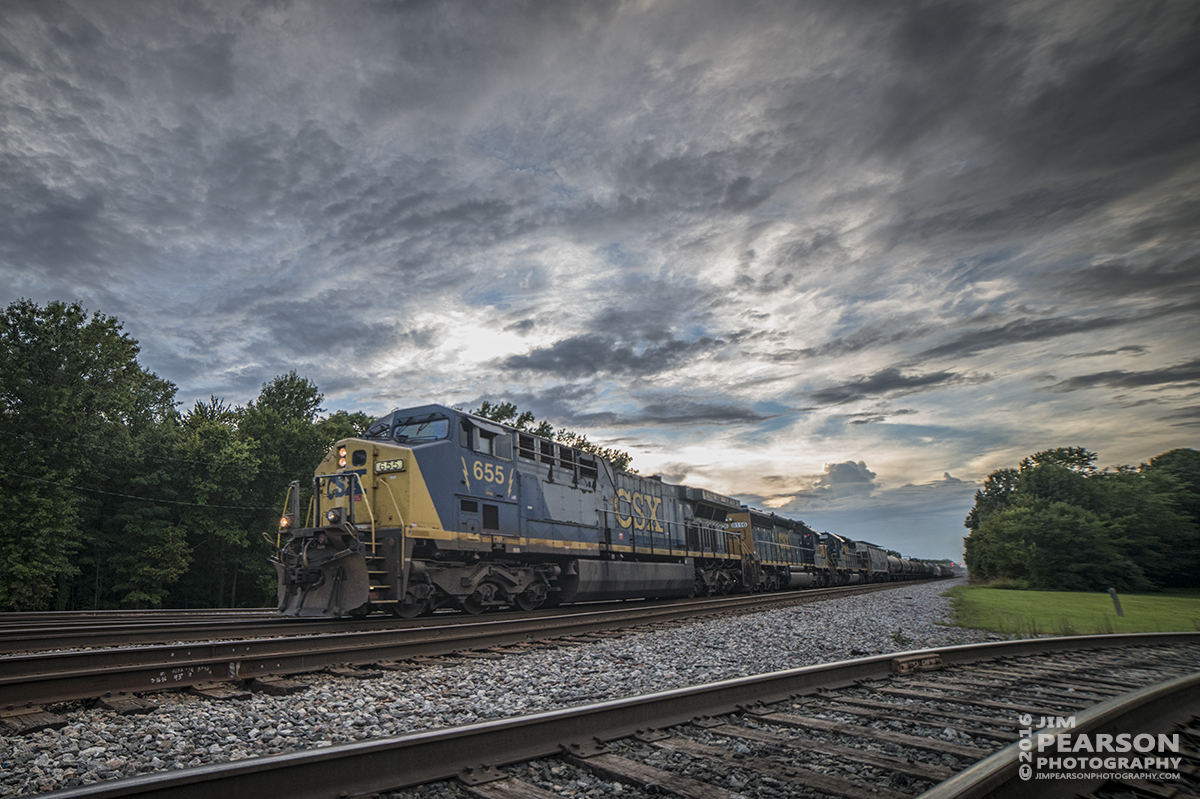 August 15, 2016 A CSX Q597 (Chicago, IL (BRC) - Nashville, TN) heads through Guthrie, Ky as light begins to fade as it heads south on the Henderson Subdivision.