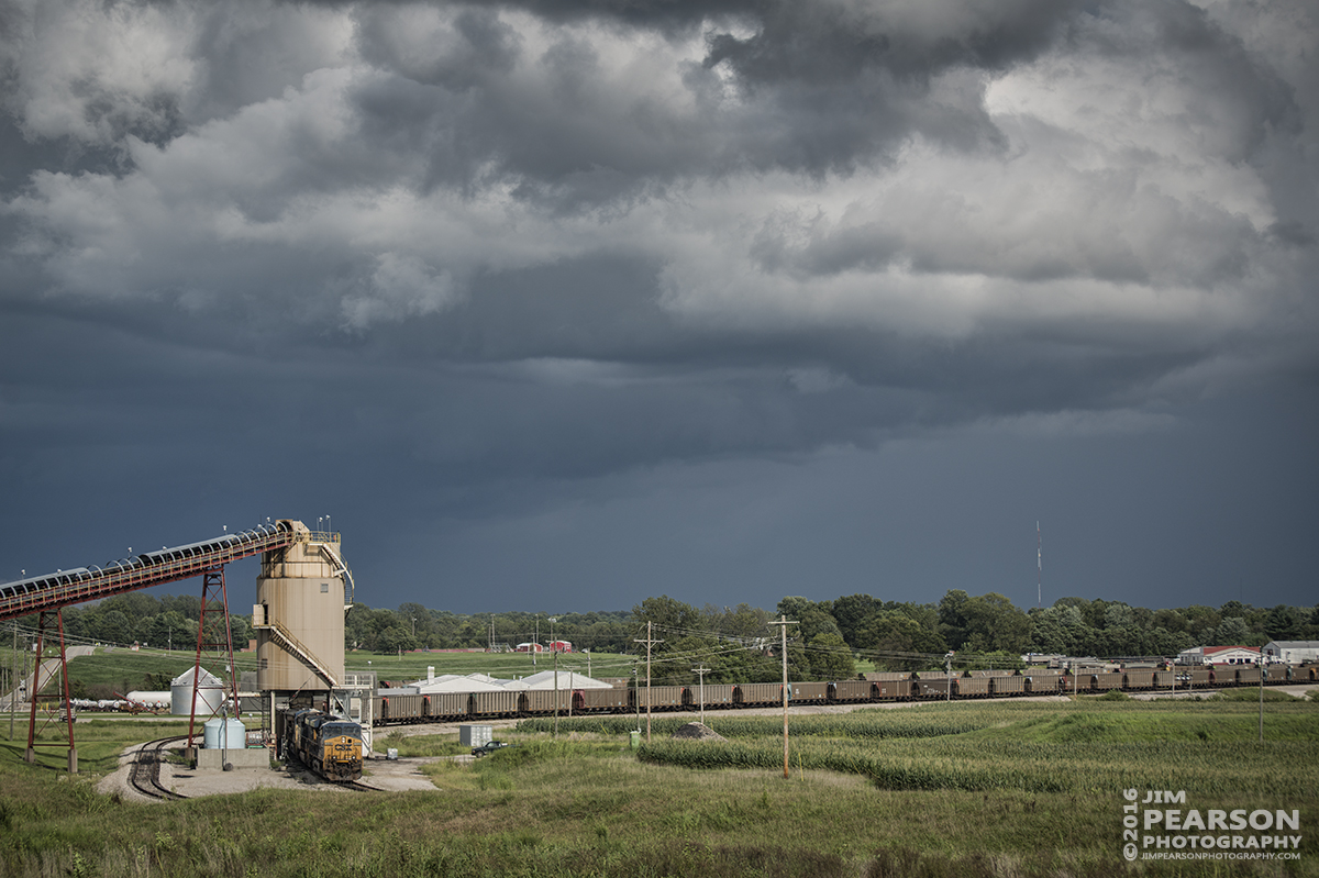 August 20, 2016 - A CSX coal train starts to load at the Alliance Coal Loadout in Princeton, Indiana as a storm moves through the area over CSX's CE&D Subdivision.
