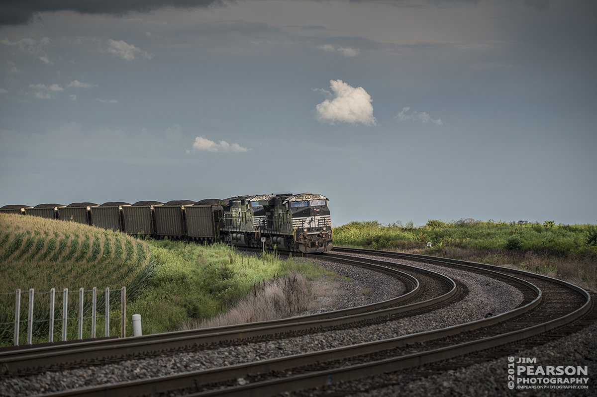 August 20, 2016 - The last light of sunset falls across the top of Norfolk Southern Railroad 7627 and 9825, on the DPU end of a loaded coal train waiting to head East from Princeton, Indiana.