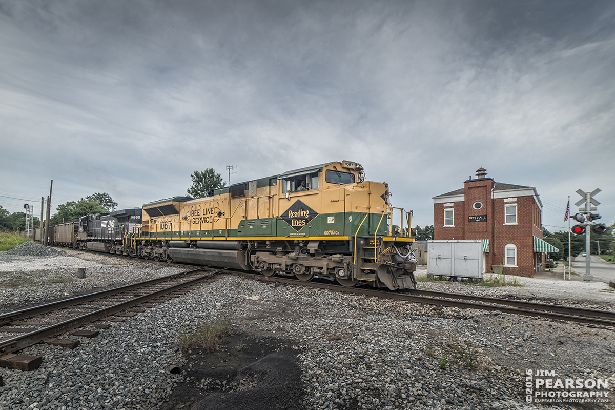 August 23, 2016 - Norfolk Southern, NS 1067 (EMD SD70ACe), the Reading Lines Heritage Unit, leads a loaded southbound Vectren coal train across NS line at the diamond on the Indiana Southern Railroad at Oakland City, Indiana.