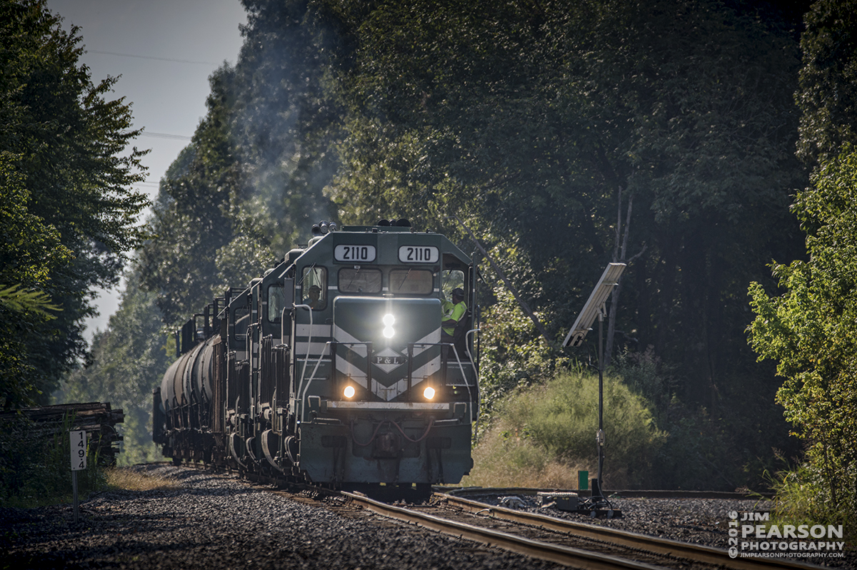 September 4, 2016 - Paducah and Louisville Railway 2110 heads up the local as it passes the PeeVee Spur switch, just south of PAL's West Yard at Madisonville, Ky, as it makes it's way north.