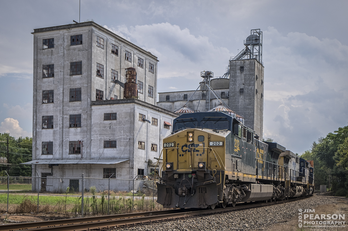 September 14, 2016 - CSX intermodal Q028-14 (Atlanta, GA - Chicago, IL) passes the old General Mills flour mill just off of 17th Street close to downtown Hopkinsville, Ky as it heads north on the Henderson Subdivision.