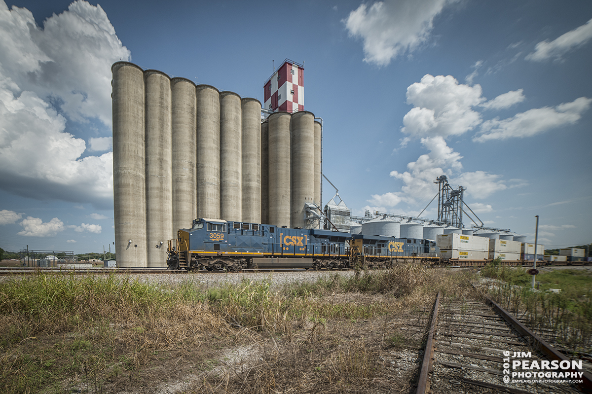 September 14, 2016 - CSX Q028 passes the grain silos at Hopkinsville Elevators on Skyline Drive in Hopkinsville, Ky as it heads north on the Henderson Subdivision.