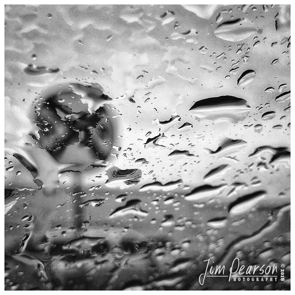 October 31, 2018 - Day 366 - iPhone 7 Plus Daily B/W Photo Challenge - Rainy Day - While waiting for my nephew Jayden to get out of school on this rainy Wednesday afternoon I shot this interesting abstract of my windshield and a railroad crossing sign! Pictures are all around you! Just open your eyes to them!