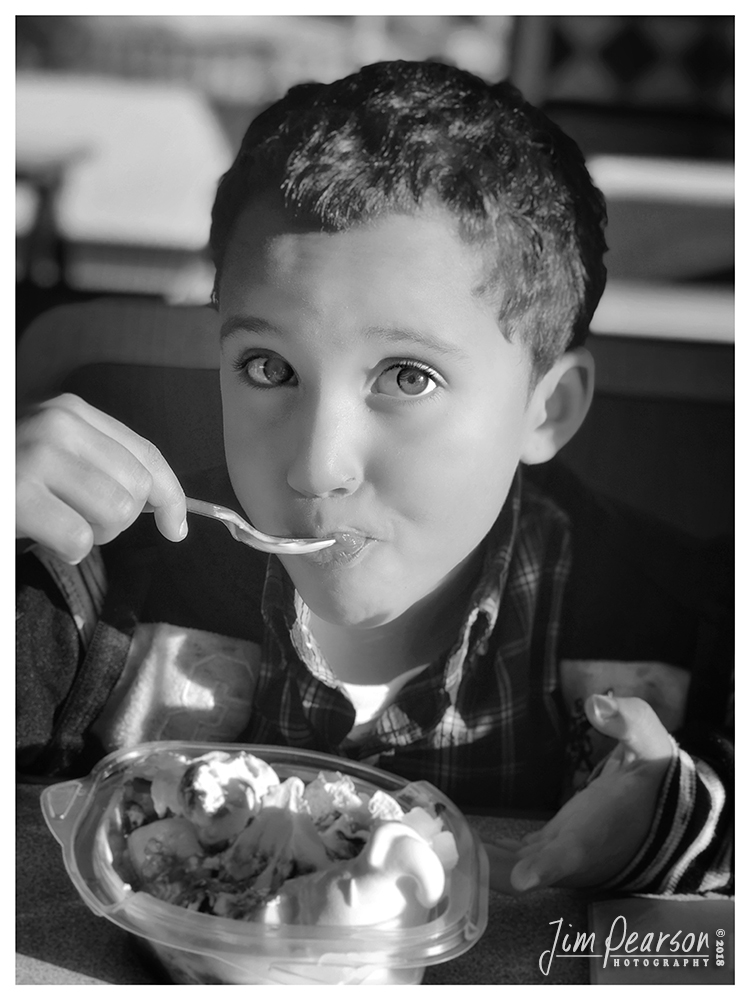 November 8, 2018 - Day 374 - iPhone 7 Plus Daily B/W Photo Challenge - Jayden - Today's portrait is of my nephew Jayden doing one of the many things he loves to do, eat a banana split at Dairy Queen!