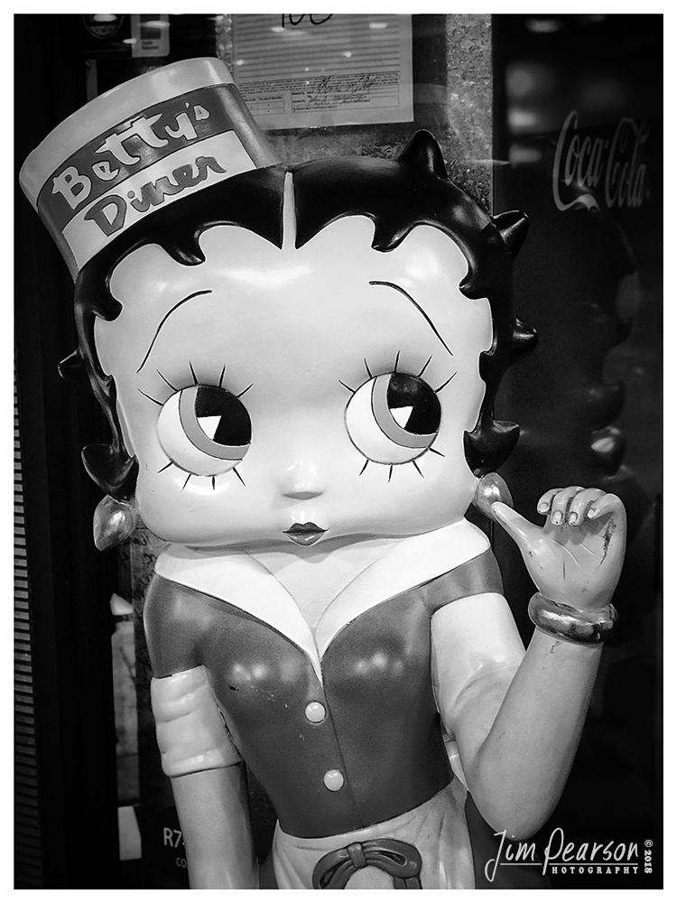 November 12, 2018 - Day 378 - iPhone 7 Plus Daily B/W Photo Challenge - Betty - When I saw Betty Boop in our mall today during my walk I knew I had to get her portrait for my Black and White portrait challenge today! Just something a bit outside the box!