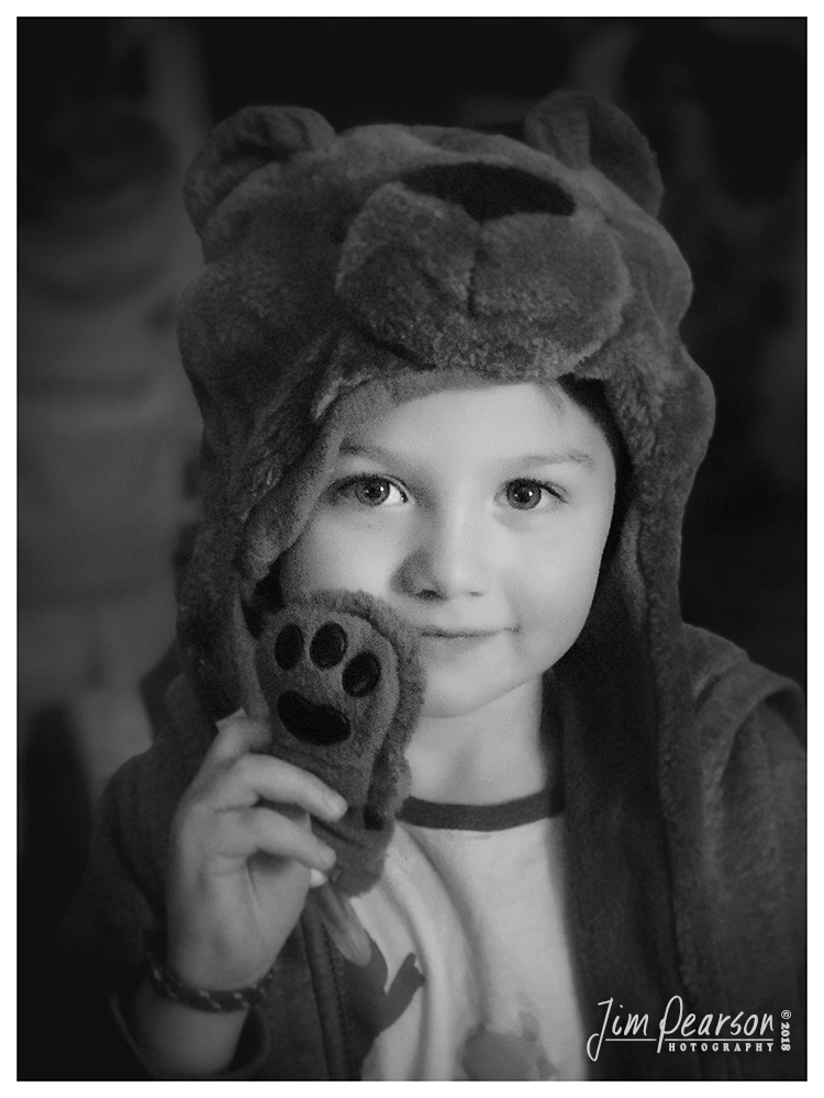 November 14, 2018 - Day 380 - iPhone 7 Plus Daily B/W Photo Challenge - The Bear Hat - Today's BW portrait is of Damion and his bear hat that mamaw dug out for him from last winter as we are fast approaching winter here this year already! Hed forgot all about it and when she pulled it out of the bag it was like a new hat all over again for him. Ah, the simple joys in life!