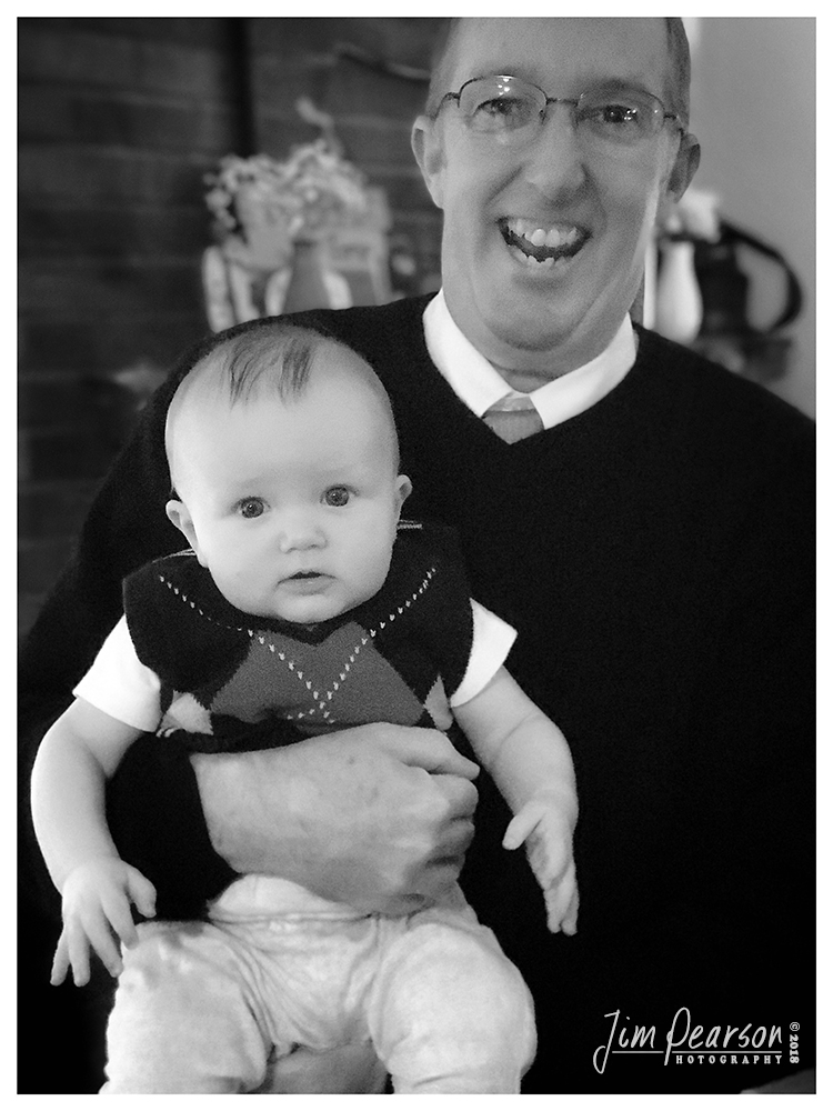 November 18, 2018 - Day 384 - iPhone 7 Plus Daily B/W Photo Challenge - Grandpa and grandson - Today's BW portrait is of my great-great nephew Liam and his grandpa Henry on the day of Liam's baptism.