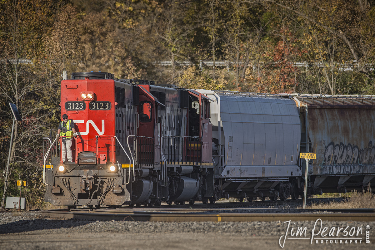October 29, 2018 - After throwing the switch at the North End of the Paducah and Louisville Railway yard, the conductor on the CN local from Fulton, Ky keeps a watchful eye as they enter the yard at Paducah, Kentucky yard with their train. - #jimstrainphotos #kentuckyrailroads #trains #nikond800 #railroad #railroads #train #railways #railway #cnrailway #canadiannationalrailway