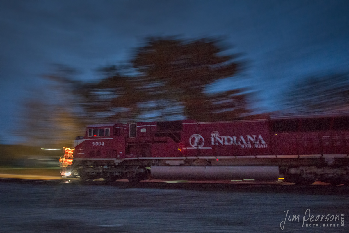 November 3, 2018 - Indiana Railroad 9004 leads Z464 as it pulls onto the CSX CE&D Subdivision's Camby siding at Terre Haute, Indiana to perform interchange work with CSX as the last light of the day fades from the sky. 

According to Wikipedia: The Indiana Rail Road (reporting mark INRD) is a United States Class II railroad, originally operating over former Illinois Central Railroad trackage from Newton, Illinois, to Indianapolis, Indiana, a distance of 155 miles. This line, now known as the Indiana Rail Road's Indianapolis Subdivision, comprises most of the former IC line from Indianapolis to Effingham, Illinois; Illinois Central successor Canadian National Railway retains the portion from Newton to Effingham. INRD also owns a former Milwaukee Road line from Terre Haute, Indiana, to Burns City, Indiana (site of the Crane Naval Surface Warfare Center), with trackage rights extending to Chicago, Illinois. INRD serves Louisville, Kentucky, and the Port of Indiana on the Ohio River at Jeffersonville, Indiana, through a haulage agreement with the Louisville & Indiana Railroad (LIRC). - #jimstrainphotos #indianarailroads #trains #nikond800 #railroad #railroads #train #railways #railway #csx #csxrailroad #inrdrailroad #indianarailroad