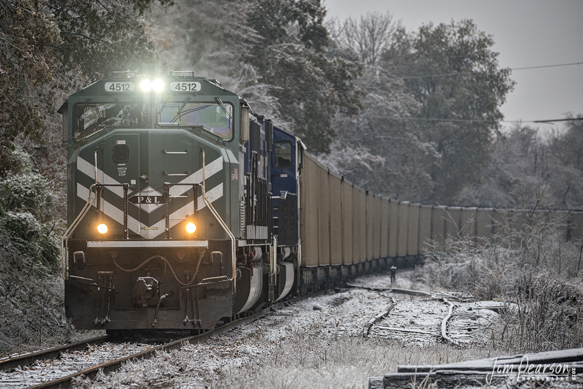 November 15, 2018 - After the recent winter storm passed through Western Kentucky, Paducah and Louisville Railways 4512 leads a loaded coal train as it waits just short of the Pride Avenue crossing in Madisonville, Ky for a signal to cross the diamond at Trident on CSX's Morganfield Branch. From here the coal train will head back onto their own property for the trip north to the Louisville Gas Electric power plant at Louisville, Ky.  - #jimstrainphotos #kentuckyrailroads #trains #nikond800 #railroad #railroads #train #railways #railway #csx #csxrailroad